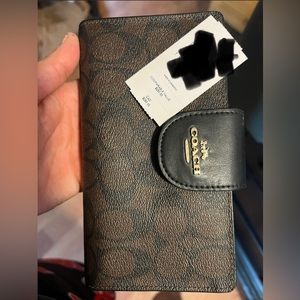 Coach wrist wallet new never used smoke free home